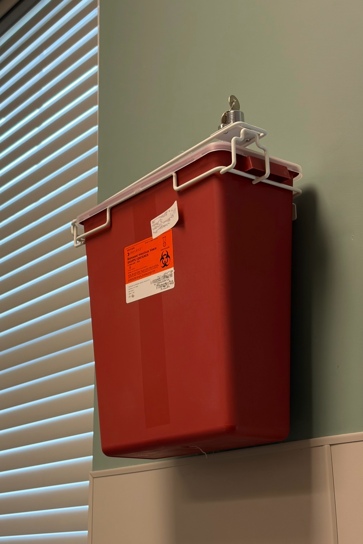 A locked container with the key left in the lock